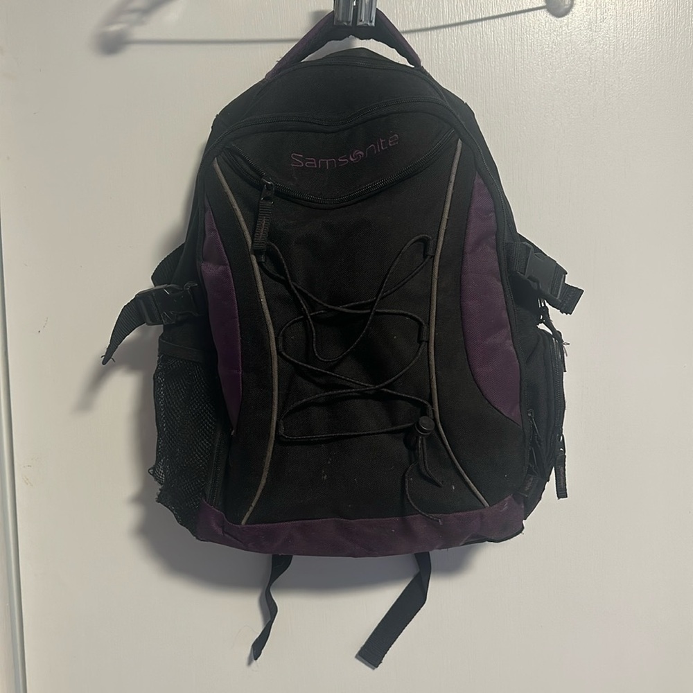 GUC: Samsonite travel backpack with comfort  padding, purple accents
